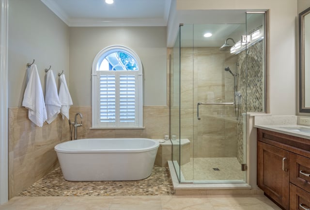 spacious master bath with freestanding white tub