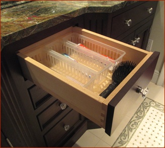 vanity drawer with accessories for toothbrushes and hair accessories