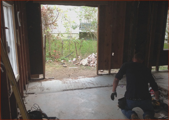 walls cut out to allow beams for lifting