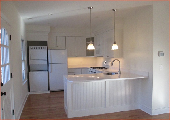 completed kitchen, with washer and dryer