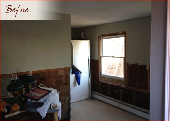 inside the cottage, sheetrock removed on lower half of walls
