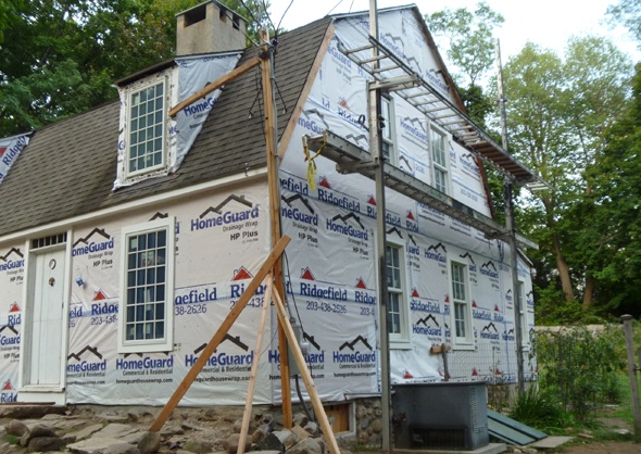 Moisture barrier has been applied to the house, along with Anderson Series 400 windows.