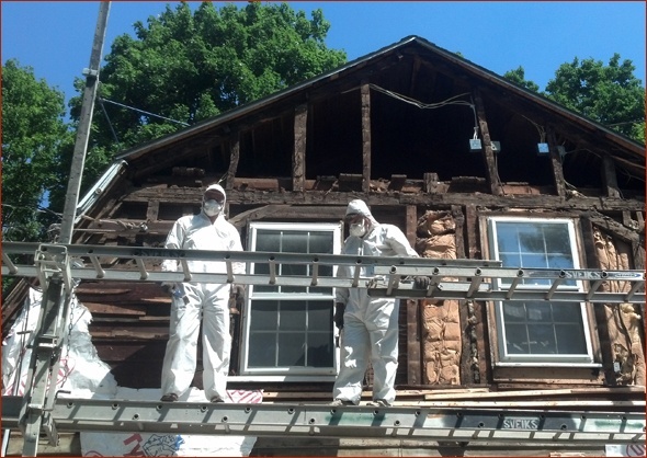 Lead-safe work practices are underway as construction begins.