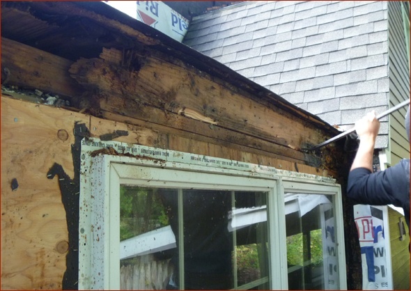 Rotted wood and sheathing has been replaced.