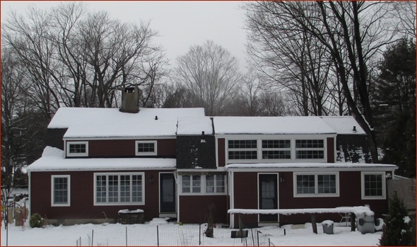 The historical home from the back, with energy efficient, low maintenance home improvements completed by Clark Construction.