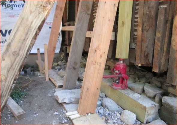 Sill plate has been removed and temporary supports put in place on this side of the house.