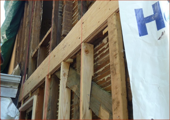 Wall is reinforced and beams have been replaced.