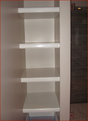Floating shelves near the shower