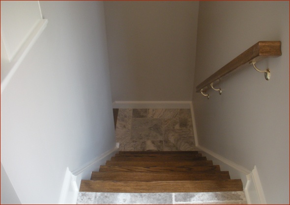 Steps to mezzanine with new handrail.