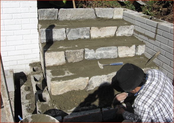 Steps from the patio to the side.