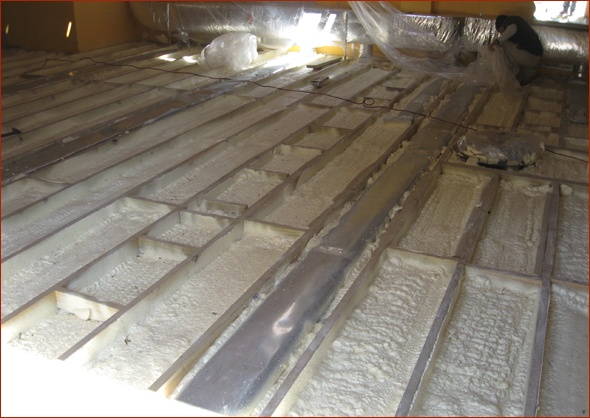The insulator returns after the rough mechanicals are complete to insulate the walls.