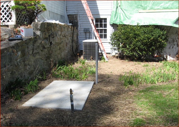 A concrete pad is poured to provide a stable base for the generator.