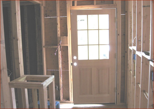 The mudroom and door to the covered porch.