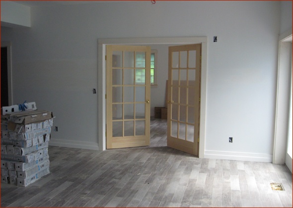 Lower level tile floor is completed at this New Canaan, CT antique home being renovated by Clark Construction of Ridgefield, CT.