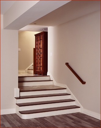 Stairs from the mudroom to the lower level