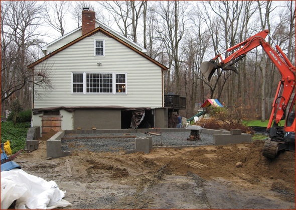 The foundation for the garage is complete