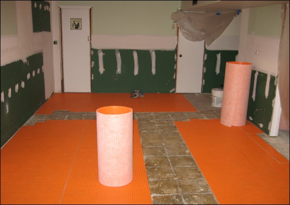 Clark Construction has used Ditramat on the basement floor to provide a solid base for the large tiles
