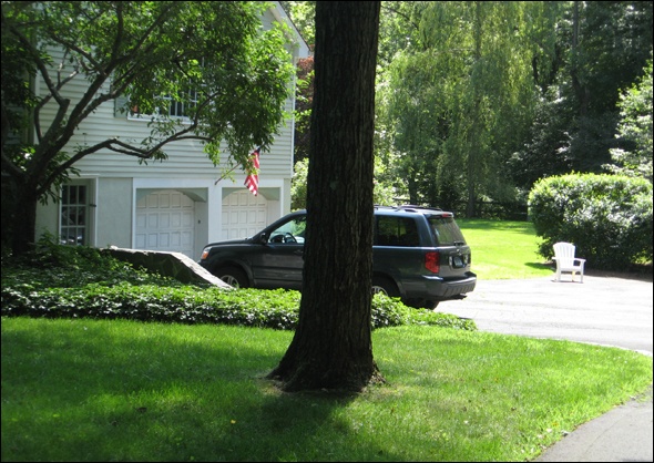 Driveway slopes towards the garage before addition is added