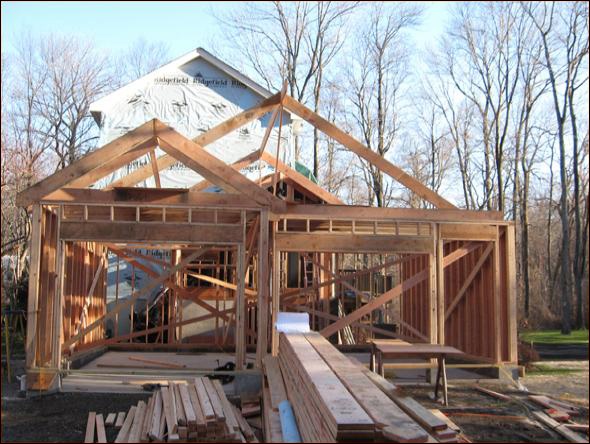 Addition design calls for repeating gables on the garage
