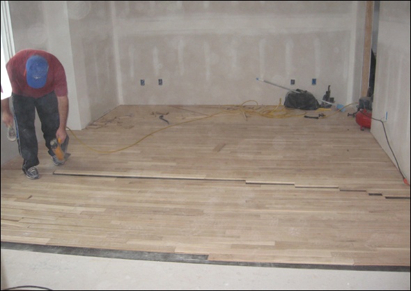 oak floor  installation in the master bedroom