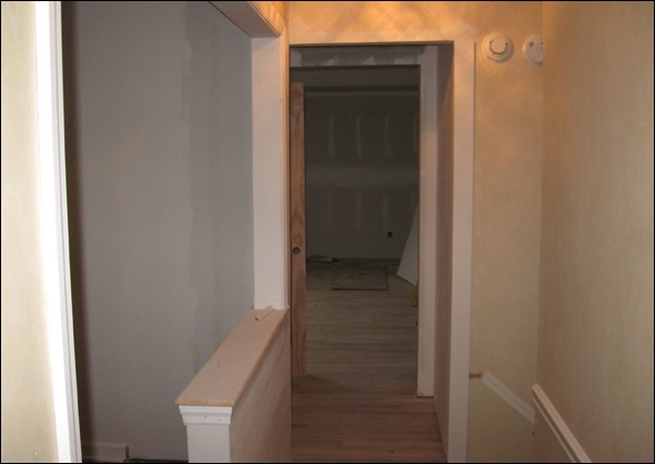 half wall at the former guest bedroom
