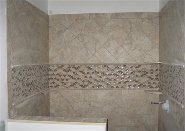 Oversized shower with interesting tile layout