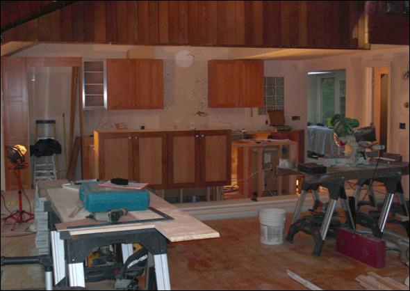 Kitchen installation progressed, awaiting templating