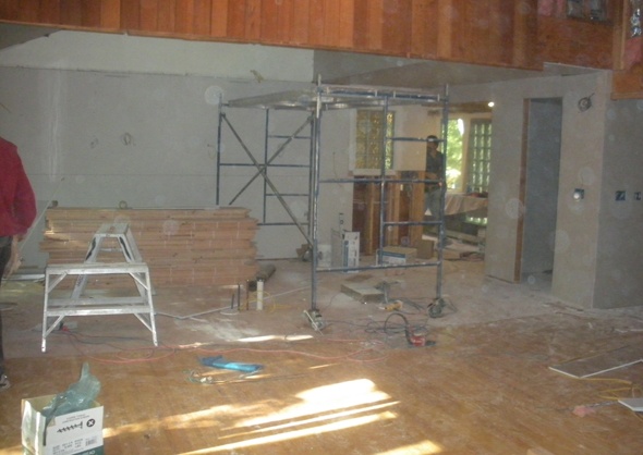 Hardwood flooring is stored inside so that it will be acclimated
