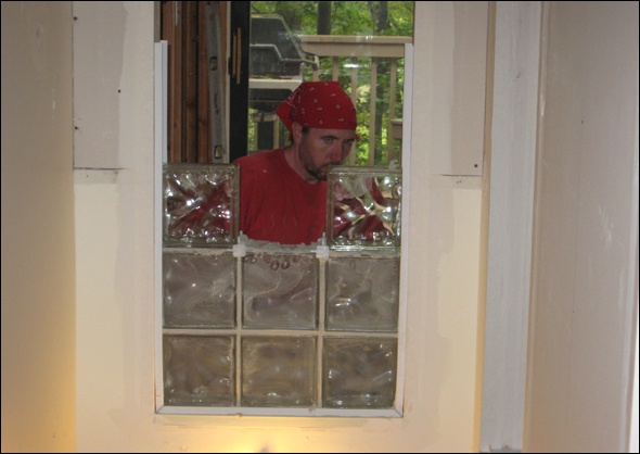 Glass blocks installed to bring in natural light and provide privacy
