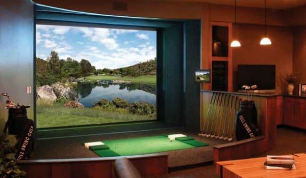 Custom golf room built in basement with all the bells and whistles for the golf enthusiast.