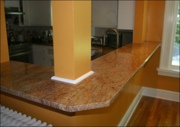 A new granite counter is installed.