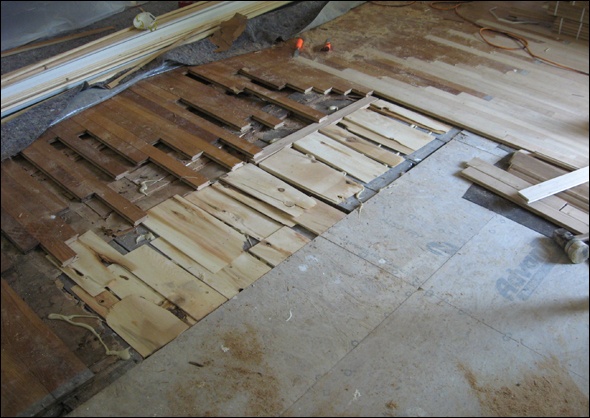 New wood flooring is woven in for a seamless transition