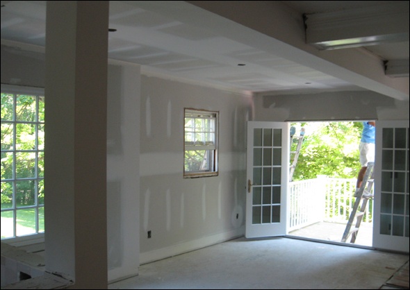 Sheetrock is installed and the room takes shape
