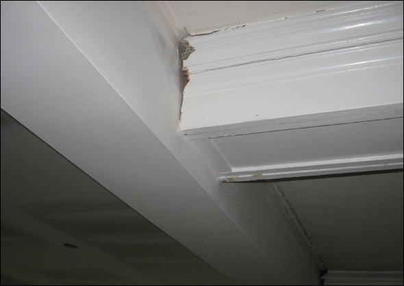 Box beams terminate at a dropped header