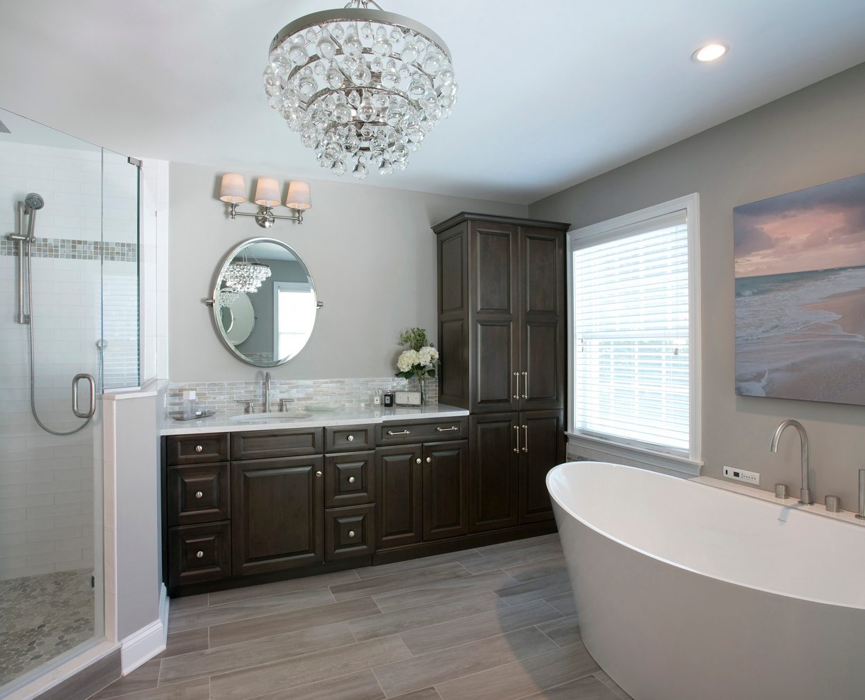 Dark Grabill cabinetry and a big shower are highlights of this Clark Construction bath design.