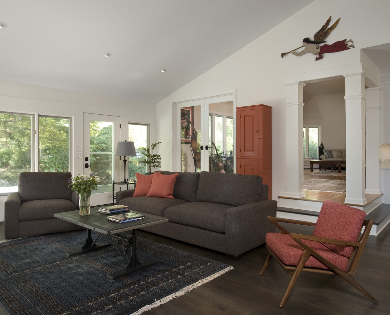 Sunroom with a view through to the music room in this Clark Construction whole house remodel.