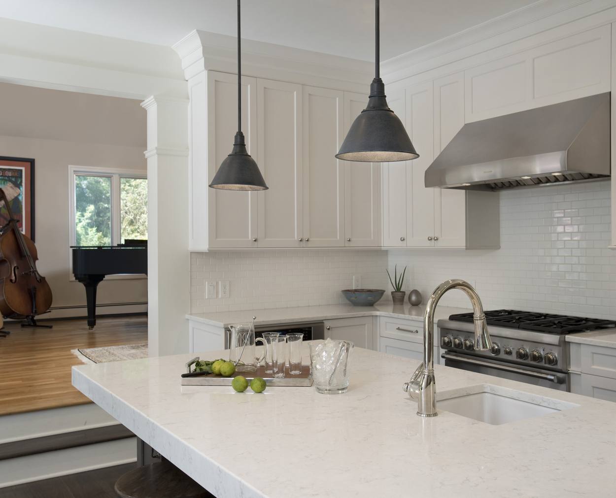 From the island into the music room, with LG counters and Grabill cabinets.