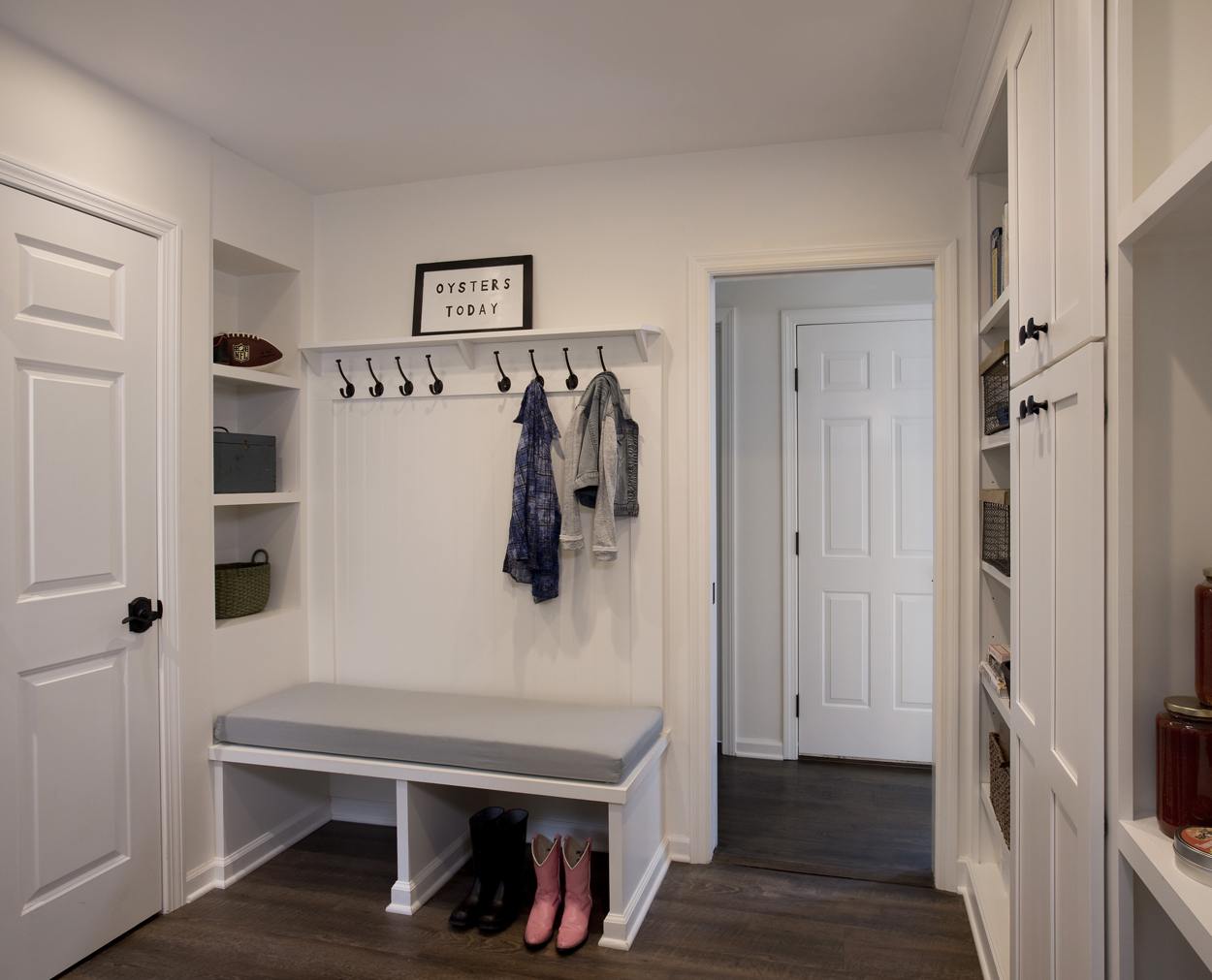 mudroom with pink boots