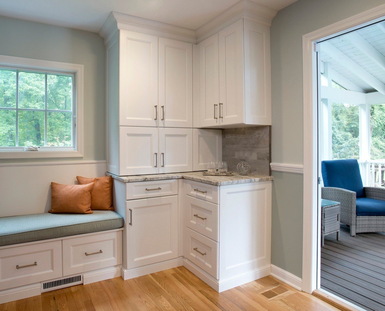 Access to the screened porch with lots of storage in the corner.