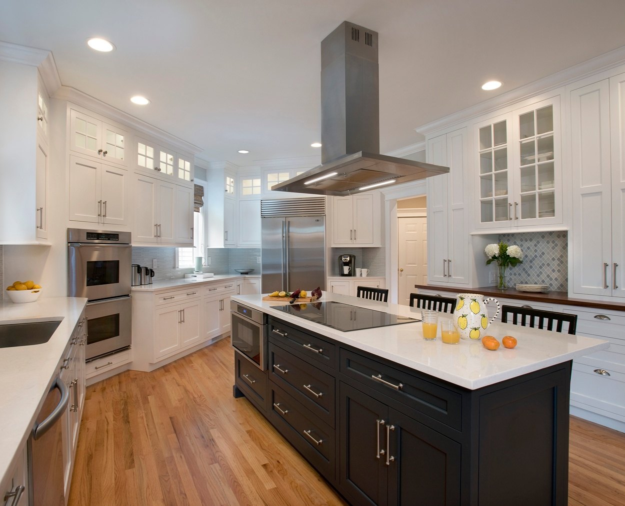 Grabill cabinets in white peony with a dark painted island 