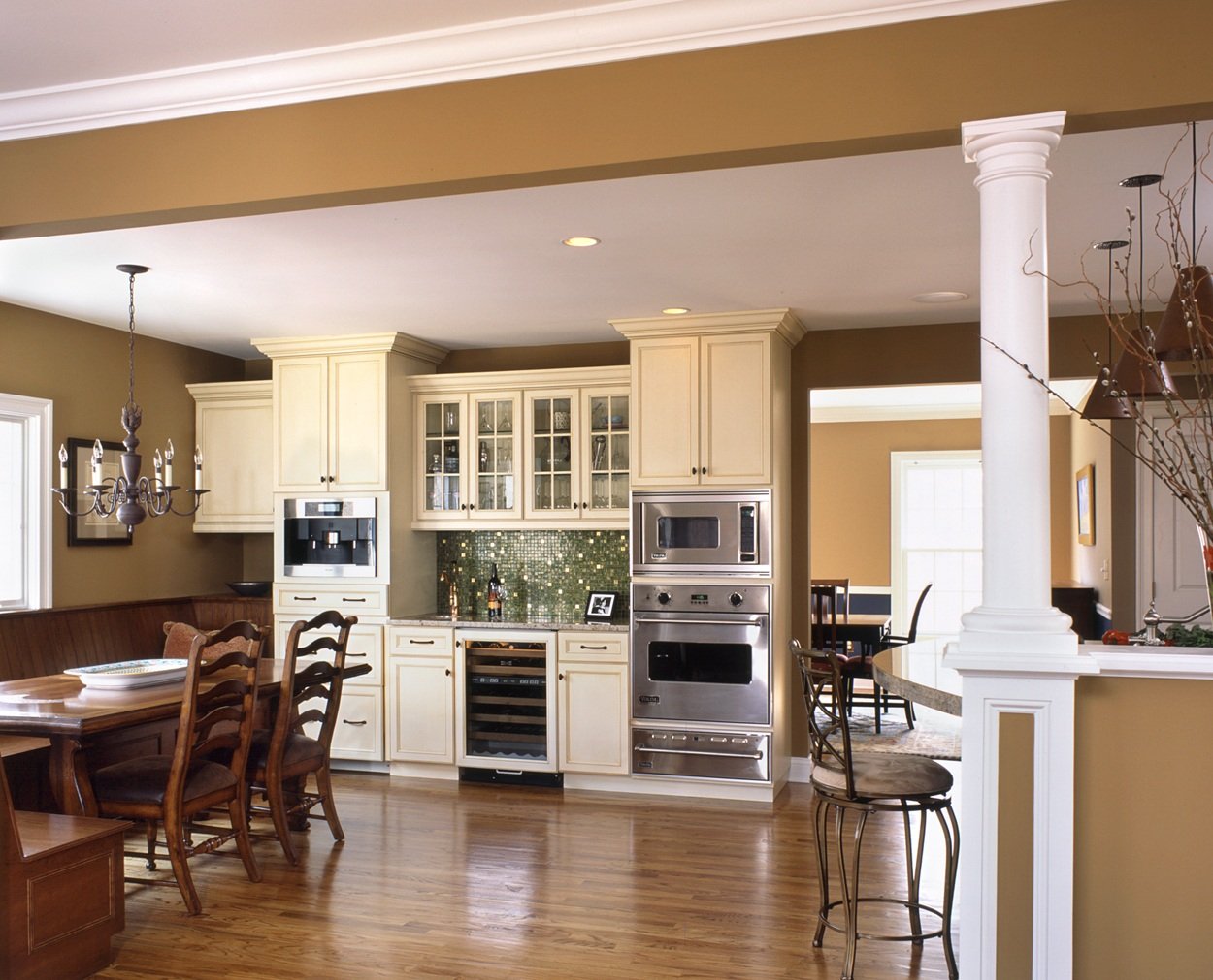 Breakfast bar and coffee area anchors this Clark Construction kitchen design.