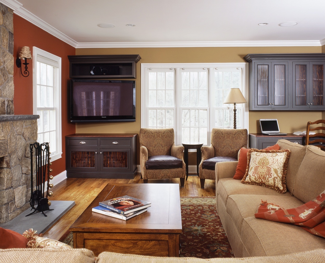 Dark builtins provide storage in this Ridgefield great room.