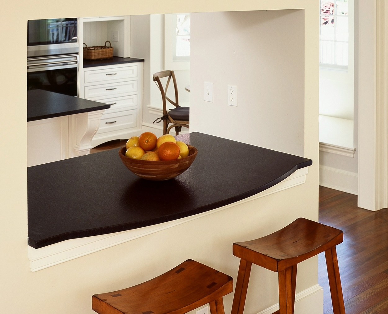 Honed absolute black granite counter passthrough