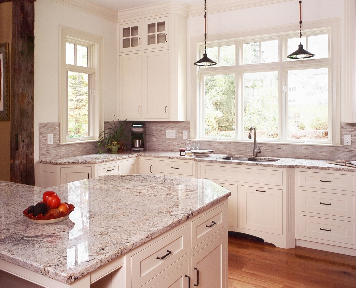 Stacked cabinetry mirrors the window grill details.