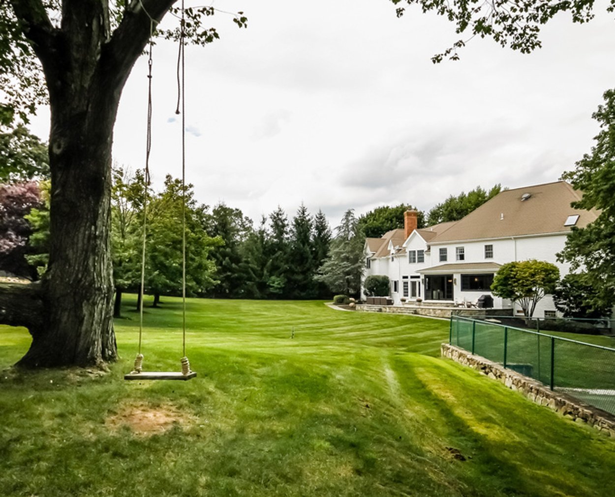 Clark Construction's kitchen addition graces a beautiful back yard.