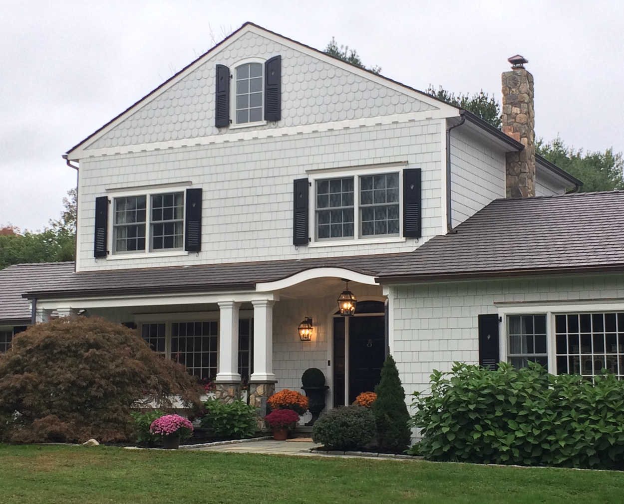 Roof turned to improve front facade on Clark Contruction's extreme makeover