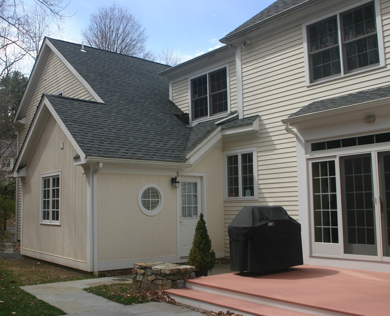 New garage bay blends into existing home.