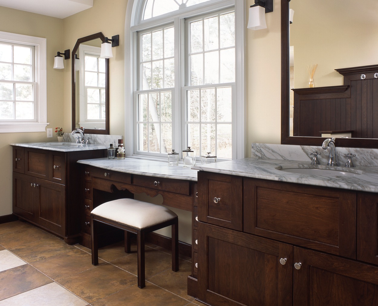 Dual vanities with a makeup area between in this Redding master bath renovation.