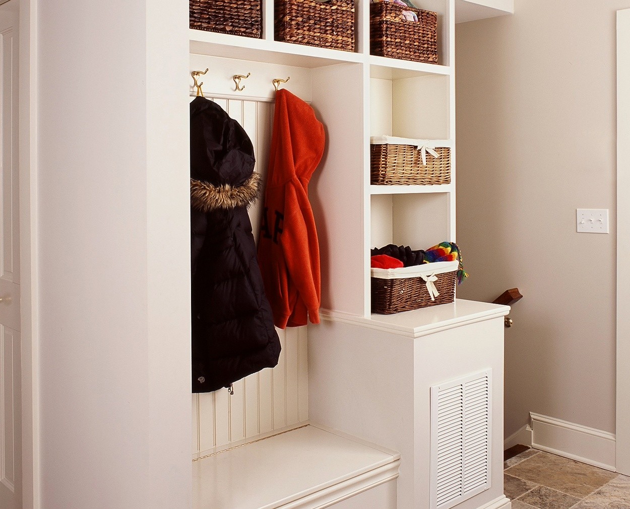 Built in cabinetry provides for a great mudroom.