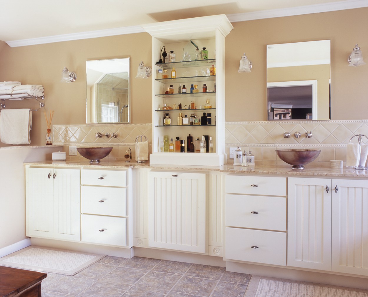 Nantucket style vanities with tower between them, in Clark Construction Wilton CT bath remodel.